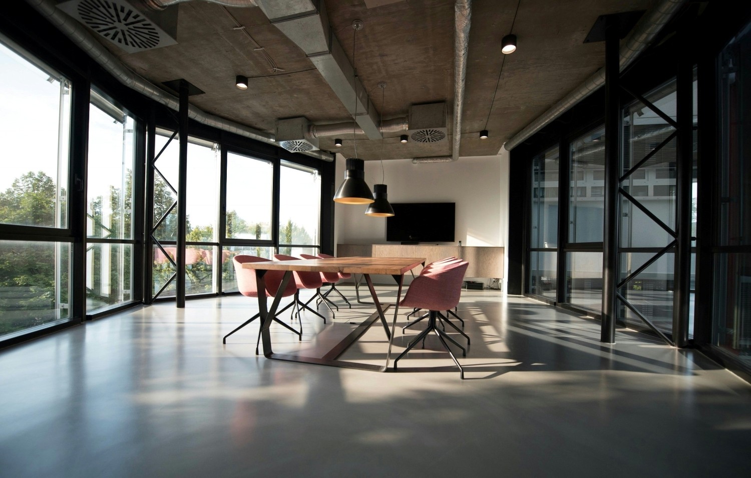 Empty meeting room in a modern corporate building showing the failure of DEI initiatives